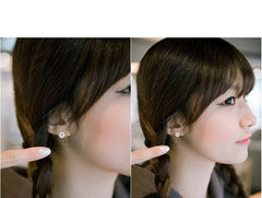 Silberne Knopfohrringe