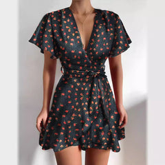 Robe taille haute à volants et col en V