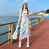 Jupe mi-longue irrégulière à nouer et à fente