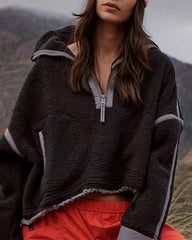 Pull en laine contrasté avec empiècement en ficelle