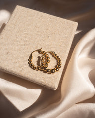 Créoles à boules dorées graduées