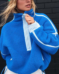 Pull en laine contrasté avec empiècement en ficelle