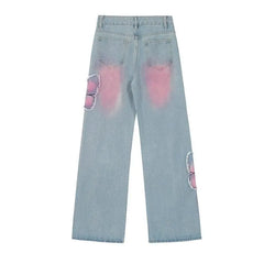 Distressed Pink Butterfly Jeans