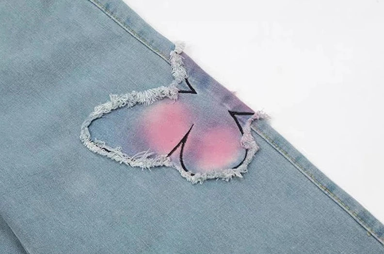 Distressed Pink Butterfly Jeans