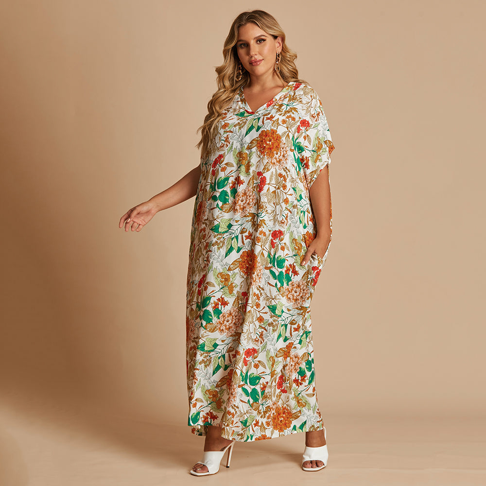 Plus-size Bohemian holiday style with v-neck floral dress Sai Feel
