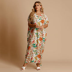 Plus-size Bohemian holiday style with v-neck floral dress Sai Feel